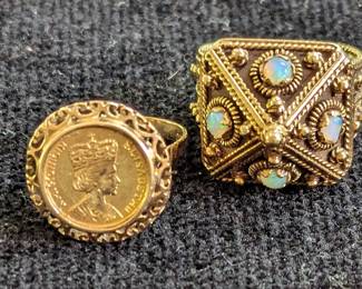 Gold coin ring. Elisabeth. We have the original appraisal for this ring. The band itself is marked 0.50.