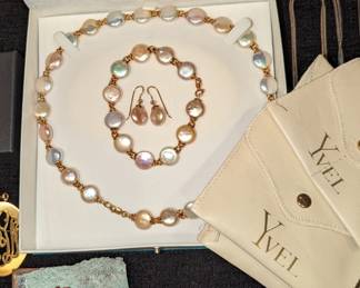 Yvel pearls set and 14 karat gold. 