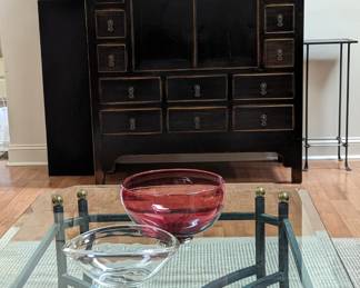 Beautiful Iron glass and brass table. Clean lines and transparent holding space in light. 