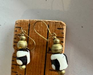 Pierced Black and White Earrings $5.00