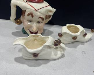 Hand painted clown tea set, pitcher, sugar bowl and creamer