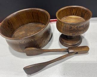 Wooden salad bowl and tongs with pedestal bowl