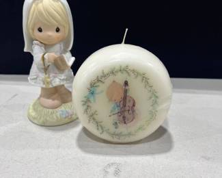 Precious porcelain figurine and candle unused