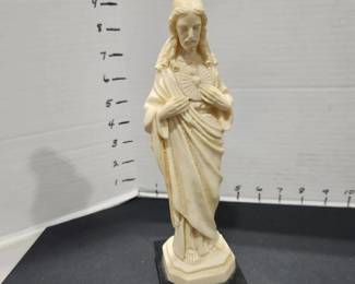 A. Santini religious figurine made in Italy