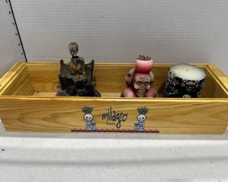 Milagro tequila box with skull candles