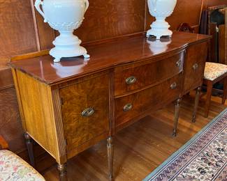 antique sideboard with pair of white porcelain urns