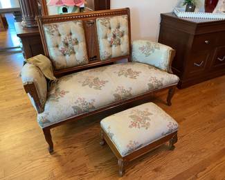 antique Eastlake style upholstered settee and footstool