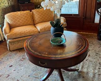 antique drum table, custom upholstered loveseats (2)