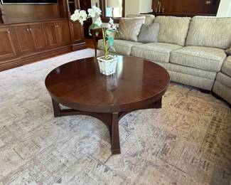 round Hickory Chair Bowman coffee table, large 12x15 Nourisan wool area rug, neutral Walter E. Smithe sectional sofa