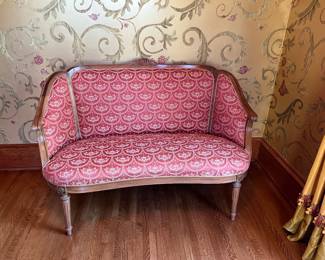 antique settee with newer upholstery