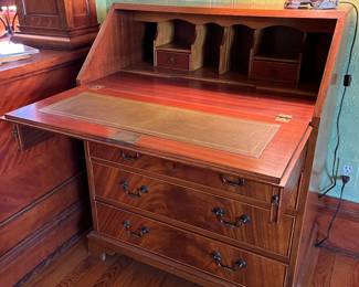 antique slant front desk with interior compartments and 4 drawers