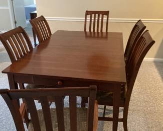 Ethan Allen 64” x 42” x30’ table in great shape with 6 regular upholstered chairs and two captains chairs.  Two 18” extensions increase length to 92”