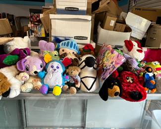 Lots of stuffed animals and children’s toys and accessories