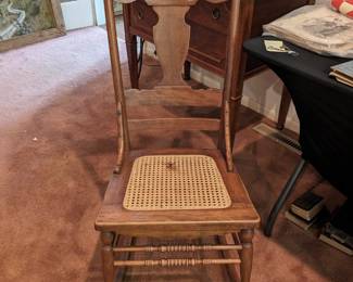 Carved Wood and cane Rocking chair