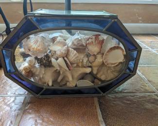 Stained glass box filled with shells