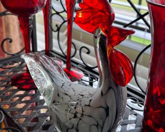 Blown glass rooster and red glass candleholders