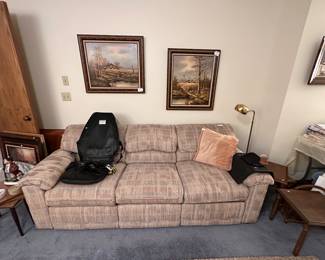 couch ----- framed art - nesting tables lower level rec room 