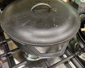 3 PIECE CAST IRON LODGE DUTCH OVEN, LID AND FRYING PAN.  LID FITS POT OR PAN.  VERY NICE.