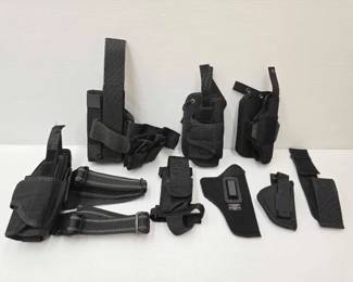 #1960 • (8) Firearm and Ammo Holsters and Pouches
