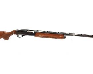 #1012 • Remington 1100 12 Ga Semi Auto Shotgun
