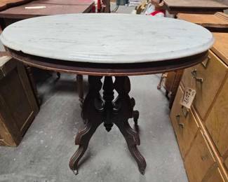 #2072 • Wooden Table with Marble Top and Wheels
