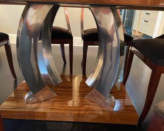 Stainless steel base to dining table