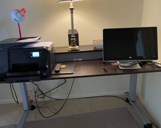 Desk, printer and lamps.