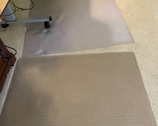 Carpet protectors for your rolling chairs. One is flexible and rolls up; the other is hard.