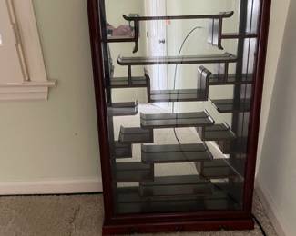 Purchased in San Francisco in the 80's. This rosewood curio is in mint condition.  