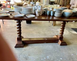 Solid oak drop leaf table with spiral legs. 