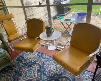 Vintage MCM Metal Patio Set with Yellow Leather Cushions
TABLE NOT INCLUDED!!
Set is in overall great shape. 
Some paint peeling on metal but hardly noticeable. Leather is in great shape without any cracks and is still soft.
Includes:
2 Patio Chairs: 25” across x 25” deep x 18” tall to seat, 3’ tall to back
Rocking Chair: 23” across x 19” deep x 18” tall to seat, 40” tall to back.
Must be able to move and load yourself.