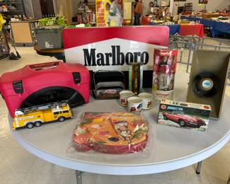 Marlboro sign, Budweiser radio tackle box, model kits, Campbell soup collection, John Deere collection, Hotwheels