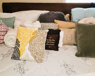 King Size mattress set and headboard. Linens and throw pillows