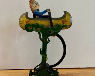 Native American in Canoe Kinetic Metal Scultpure