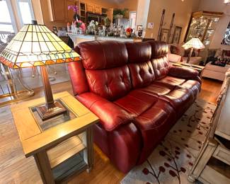 Leather sofa with recliner