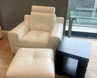 5. White leather chair and ottoman part of couch sectional