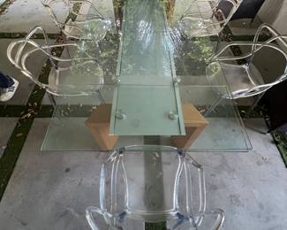 28.  view of dining table and ghost chair