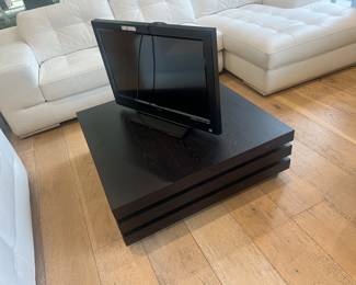 4. Well designed square wood coffee table