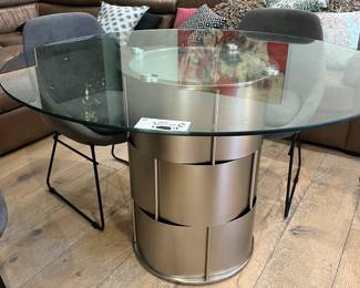 11. Full view of 48 inch glass top on brush steel base, set includes five upholstered chairs