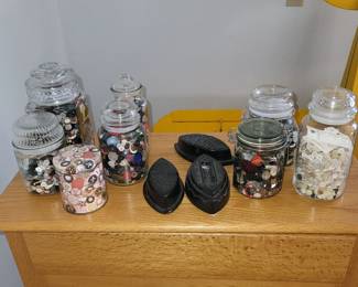 Several jars of buttons