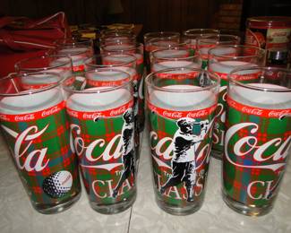 16 in total, mint condition Coca Cola golf glasses