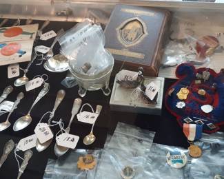The jewelry case next to the checkout is full of sterling silver pieces and high value items.  If you want to examine an item from the case, we ask that you submit your photo ID as a pledge that you aren't going to take off with the item, without paying.