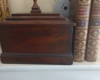Early storage box and leather bound books