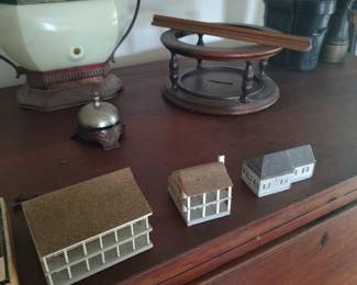 Featuring a few of the very large number of small wooden houses and other treen items.