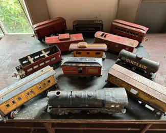 A small number of a very large collection of two (HO) and three track trains dating from the 1940's and later, Lionel, Marx, and others plus equipment, transformers, wiring, etc.