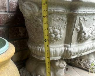 The following 6 pics are some of the large pots/planters and their measurement.  This Concrete planter is 20 inches high.
