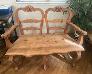 There is a pair if these Mexican Love Seat Style Benches. 48 inches wide, 39 Inches tall, and 22 inches Deep