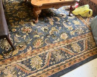 This Beautiful Wool Rug made in India measures 9'6" x 13'6"
