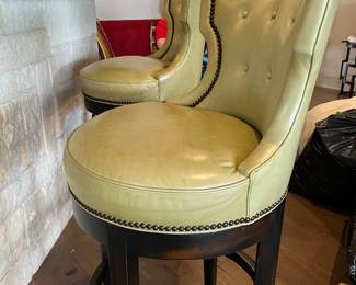 chartreuse green swiveling bar stools with nail head trim