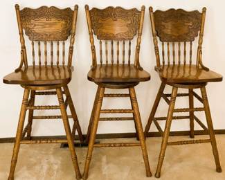 Set of Three Wooden Bar Stools with Ornate Carvings